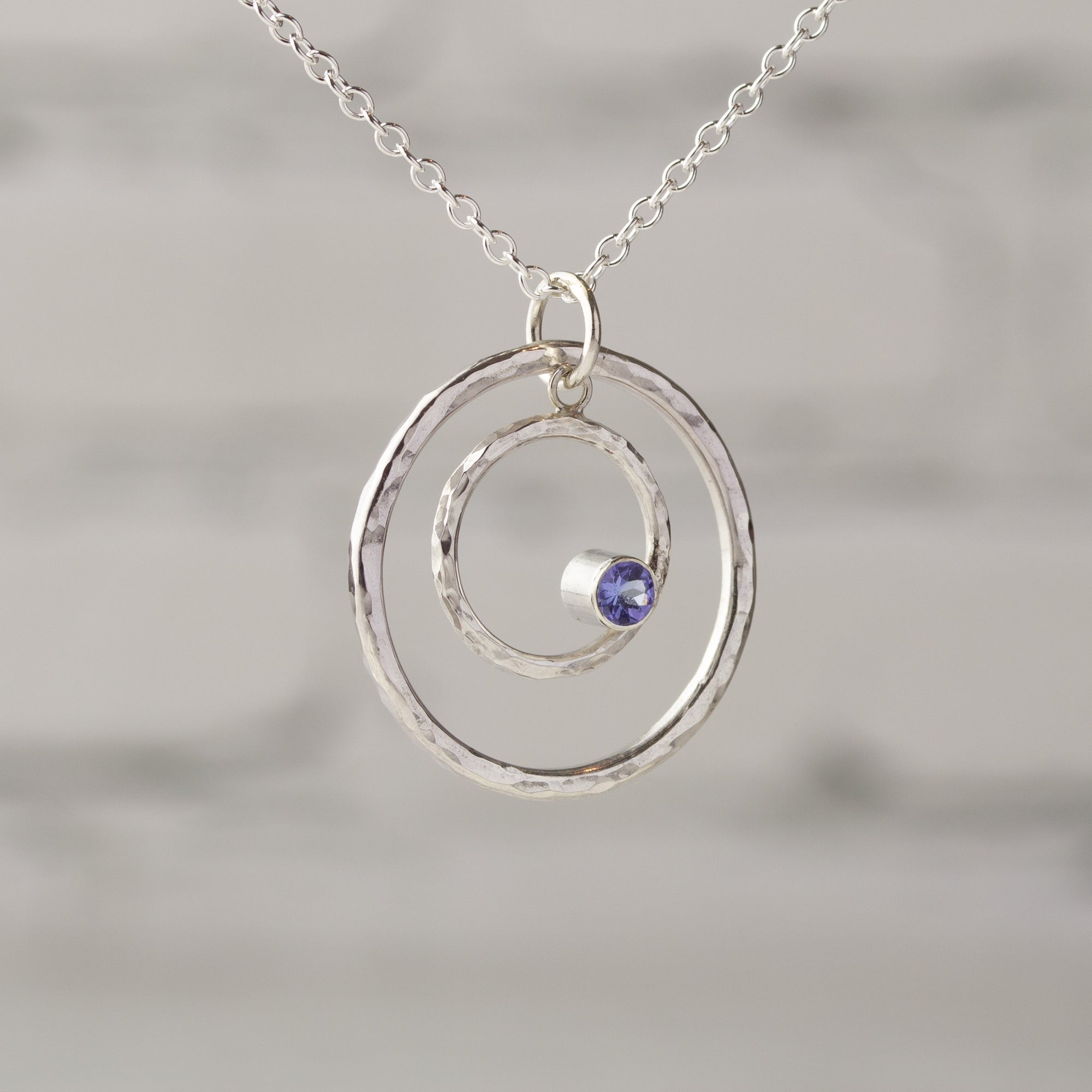 Caldera Eclissi Doppia Tanzanite Pendant