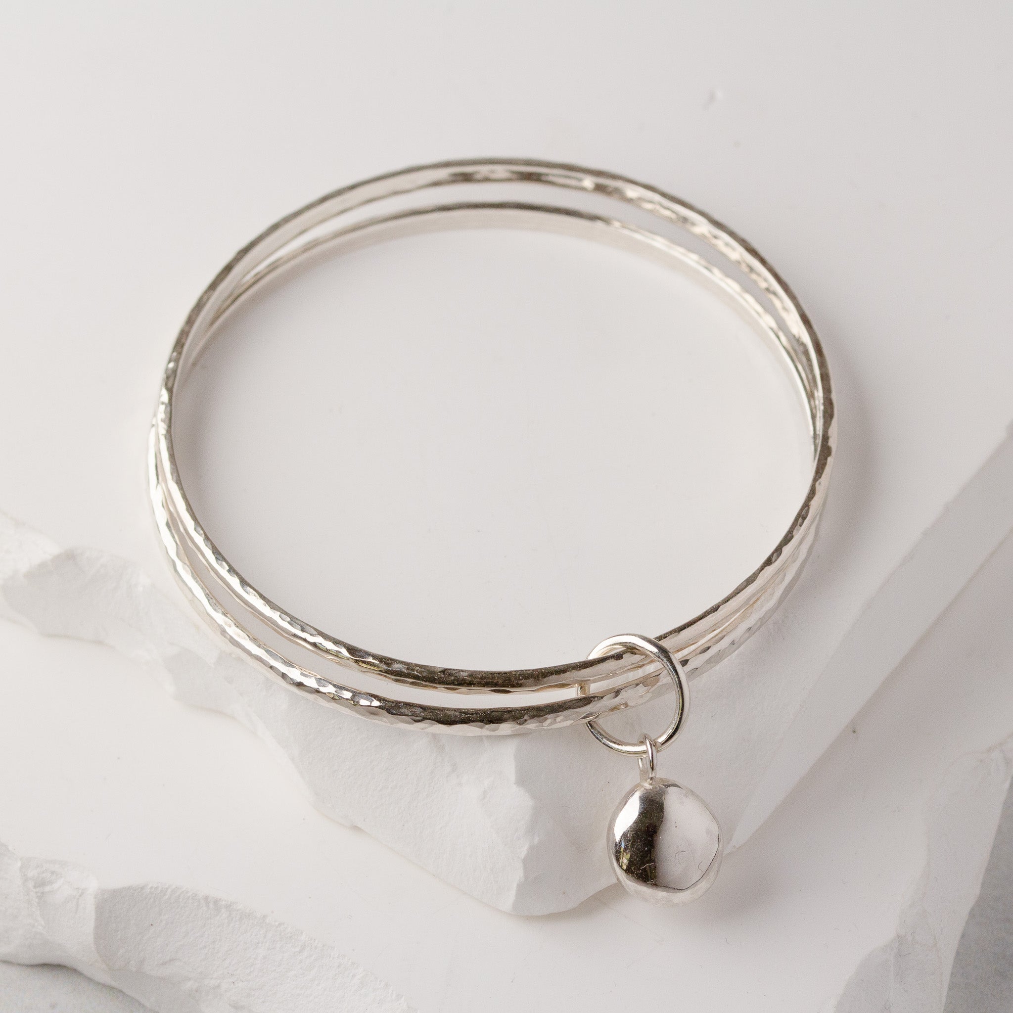 Mezza Hammered Silver Bangles with Pebble Charm