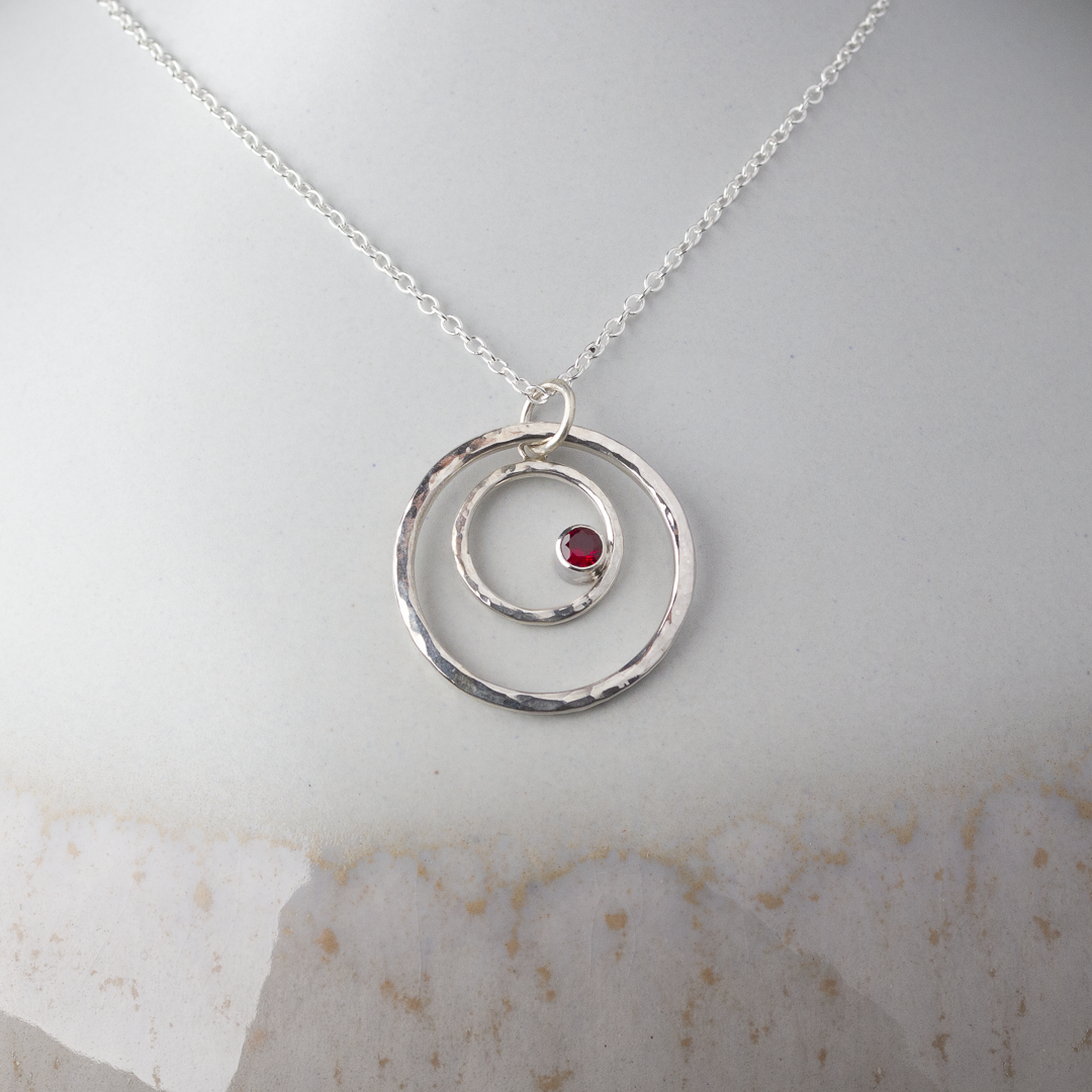 Caldera Eclissi Doppia Ruby Pendant