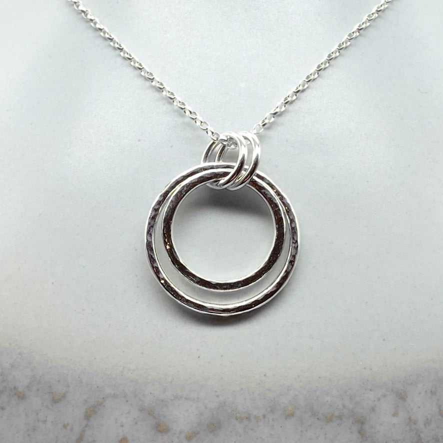 Caldera Cirque Nocturno handmade silver pendant necklace face-on