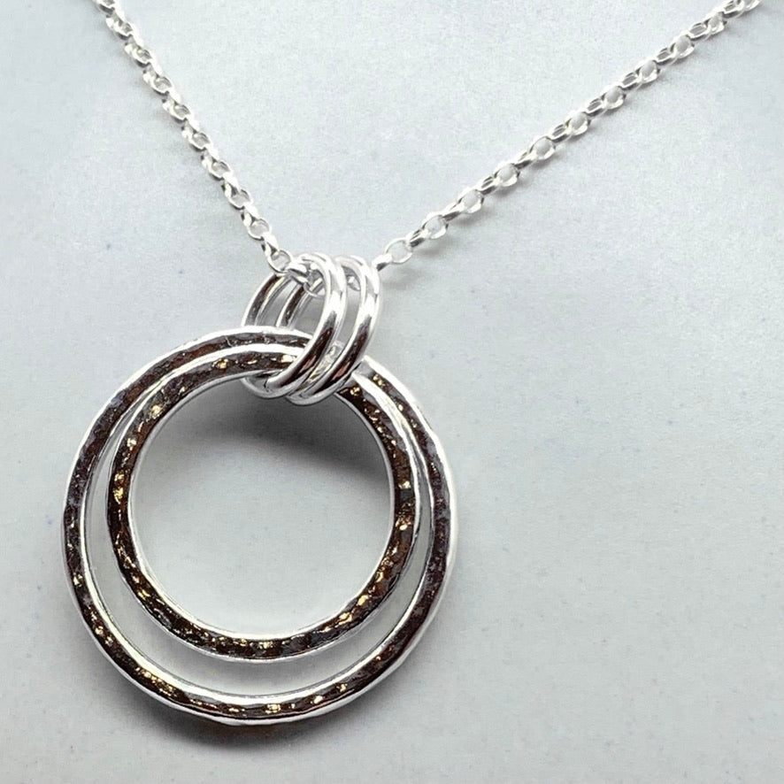 Caldera Cirque Nocturno handmade silver pendant necklace swinging