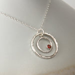 Caldera Eclissi Doppia Garnet Pendant