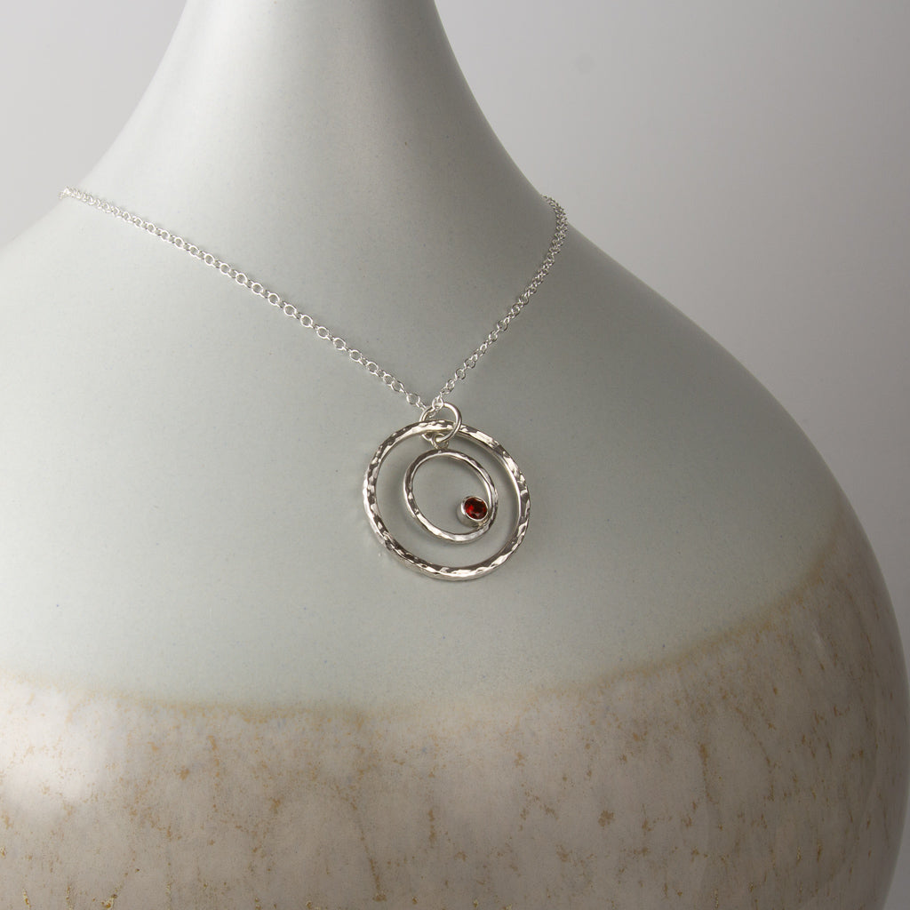 Caldera Eclissi Doppia Garnet Pendant