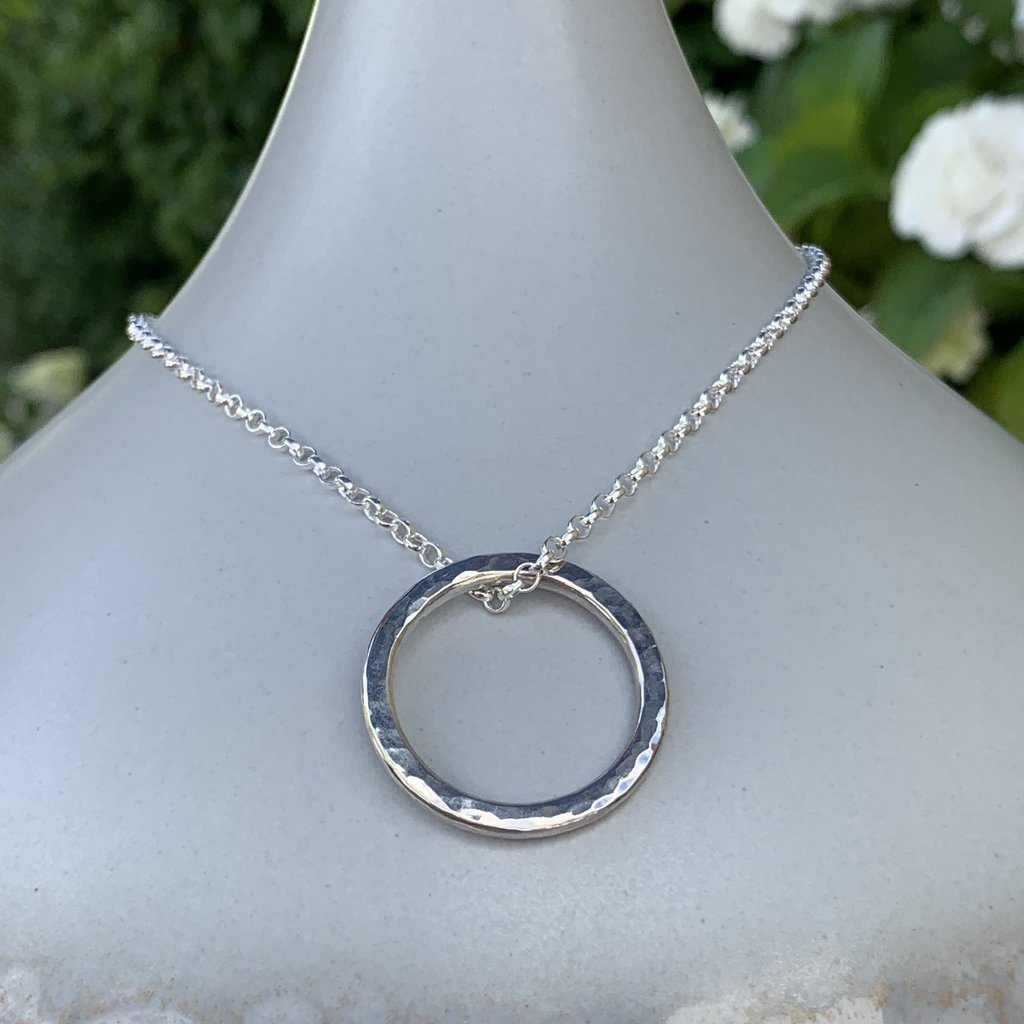 Caldera Soltera circle pendant necklace in chunky sterling silver - close-up