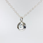 Sterling Silver Pebble Charm Pendant with Sky Blue Topaz